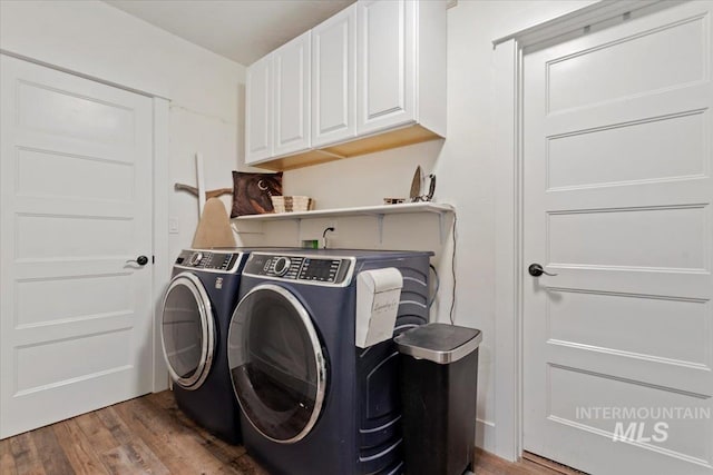 15916 Hill Top Cir, Wilder, ID 83676 - laundry area featuring cabinet space, washing machine and clothes dryer, and light wood-style flooring