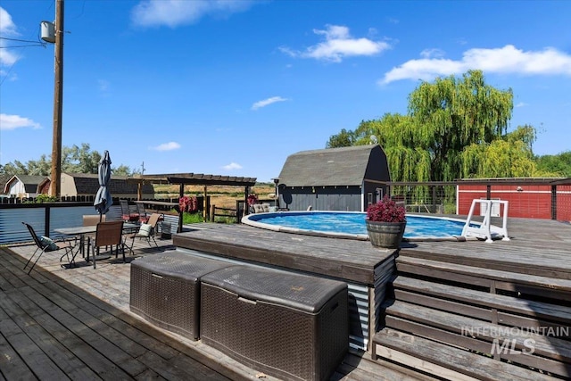 15916 Hill Top Cir, Wilder, ID 83676 - wooden terrace featuring outdoor dining area