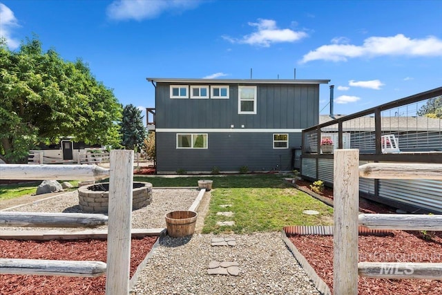 15916 Hill Top Cir, Wilder, ID 83676 - rear view of property featuring a fire pit and a yard
