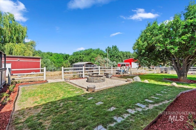 15916 Hill Top Cir, Wilder, ID 83676 - view of grassy yard featuring an outbuilding and an exterior structure