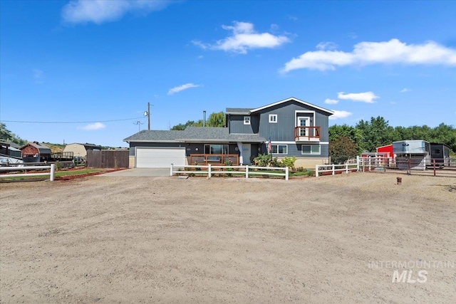 15916 Hill Top Cir, Wilder, ID 83676 - view of front of property with an attached garage and driveway