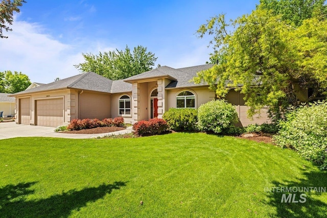 single story home featuring a garage, a front lawn, concrete driveway, and a shingled roof