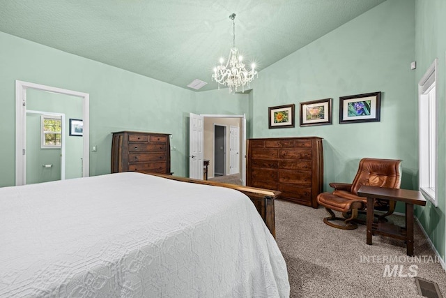bedroom featuring carpet floors, a chandelier, and high vaulted ceiling