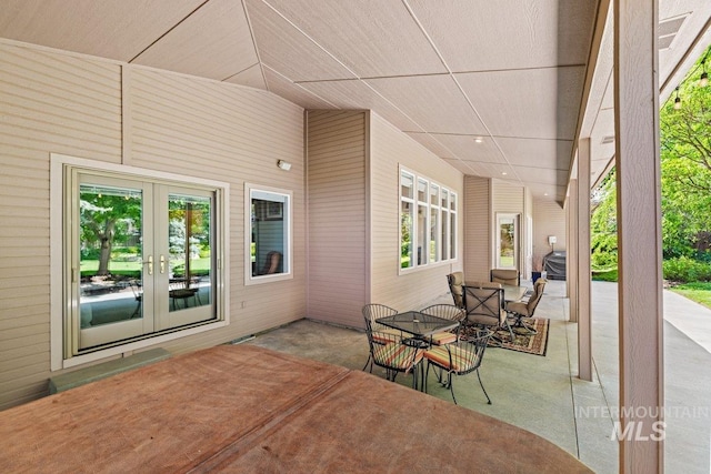 view of patio / terrace featuring outdoor dining area and french doors