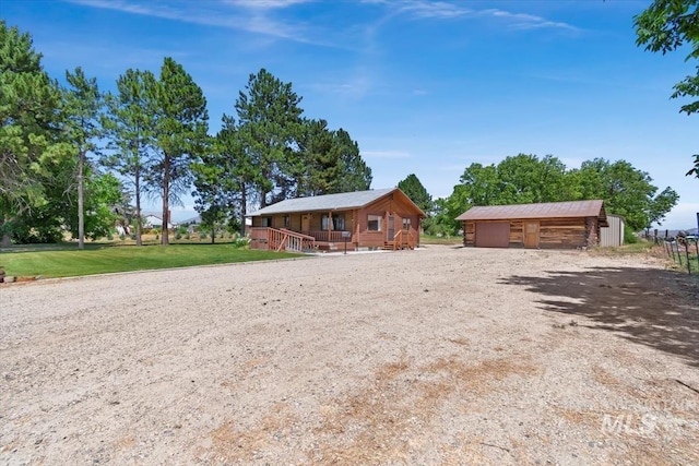 2974 Ua Ave, Emmett, ID 83617 - log cabin featuring a garage and an outdoor structure