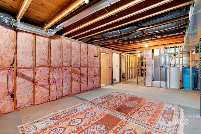 2974 Ua Ave, Emmett, ID 83617 - unfinished basement featuring a water pressure tank, electric panel, and gas water heater