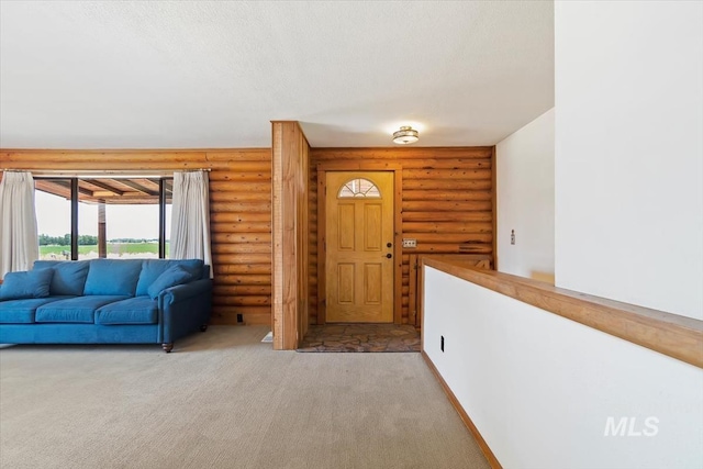 2974 Ua Ave, Emmett, ID 83617 - carpeted foyer with rustic walls and a textured ceiling