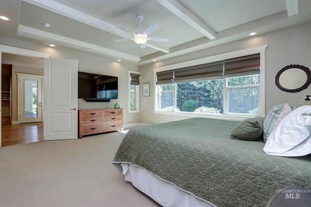 bedroom featuring a raised ceiling, ceiling fan, carpet flooring, and recessed lighting