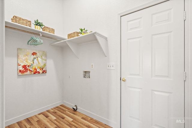 81 N Mirage St, Nampa, ID 83651 - washroom with baseboards, light wood-type flooring, hookup for a washing machine, and laundry area