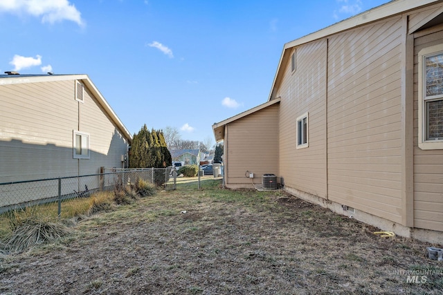 81 N Mirage St, Nampa, ID 83651 - view of home's exterior featuring central AC and fence