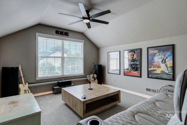 10551 W Deep Canyon Dr, Star, ID 83669 - carpeted living area featuring ceiling fan and vaulted ceiling