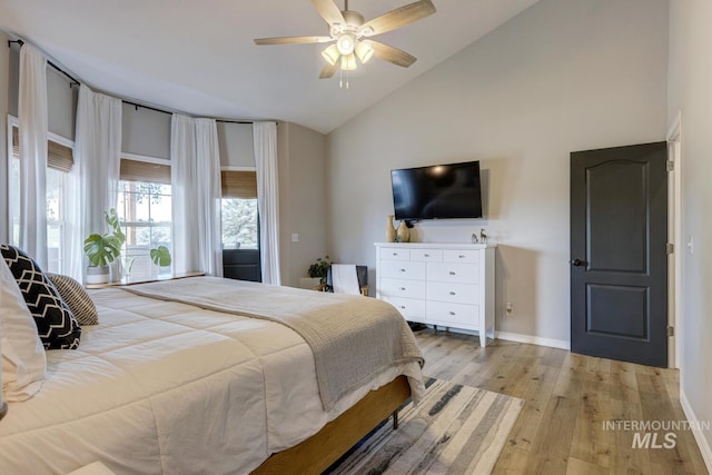 10551 W Deep Canyon Dr, Star, ID 83669 - bedroom featuring light wood-style flooring, high vaulted ceiling, and ceiling fan
