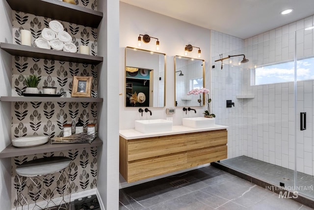 10551 W Deep Canyon Dr, Star, ID 83669 - bathroom featuring a stall shower, double vanity, and tile patterned flooring