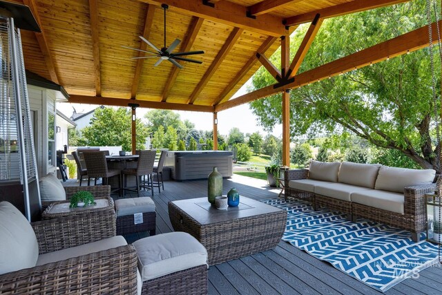 10551 W Deep Canyon Dr, Star, ID 83669 - wooden deck with an outdoor living space and ceiling fan