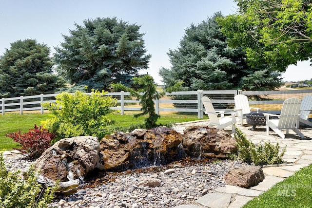 10551 W Deep Canyon Dr, Star, ID 83669 - view of yard featuring a fire pit