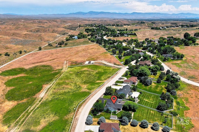 10551 W Deep Canyon Dr, Star, ID 83669 - aerial overview of property's location with a mountain backdrop