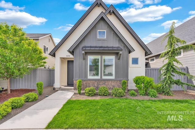 10179 Silversun St, Nampa, ID 83687 - view of front of house featuring board and batten siding and brick siding