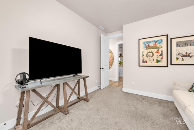 10179 Silversun St, Nampa, ID 83687 - living room featuring light carpet and baseboards
