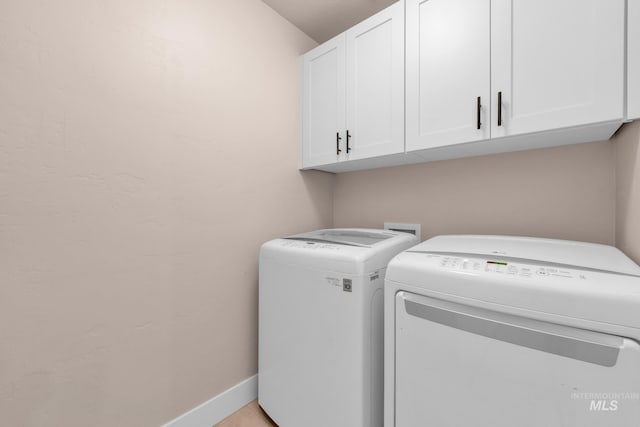 10179 Silversun St, Nampa, ID 83687 - laundry area with cabinet space, independent washer and dryer, and baseboards