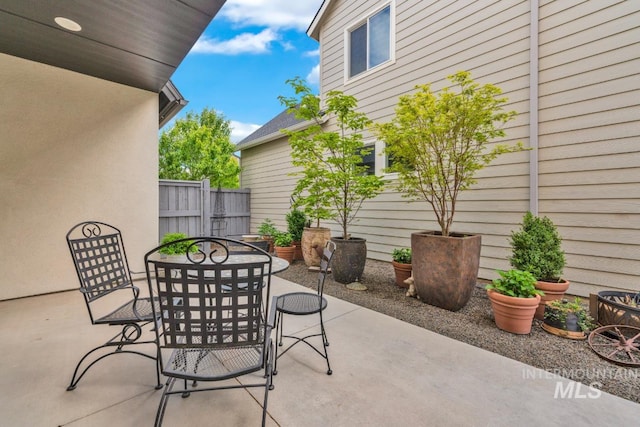 10179 Silversun St, Nampa, ID 83687 - view of patio with outdoor dining area