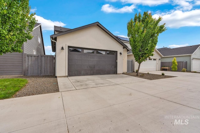 10179 Silversun St, Nampa, ID 83687 - single story home with stucco siding, driveway, and a garage