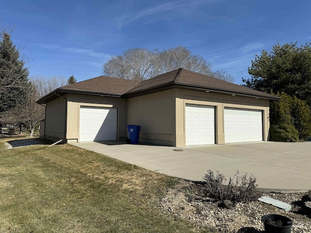 garage with a yard