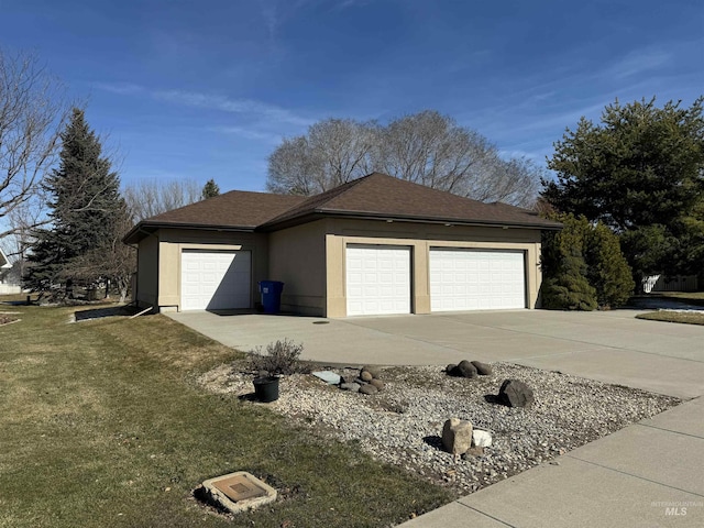 garage with a yard