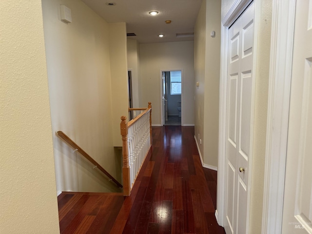 corridor with dark wood-type flooring