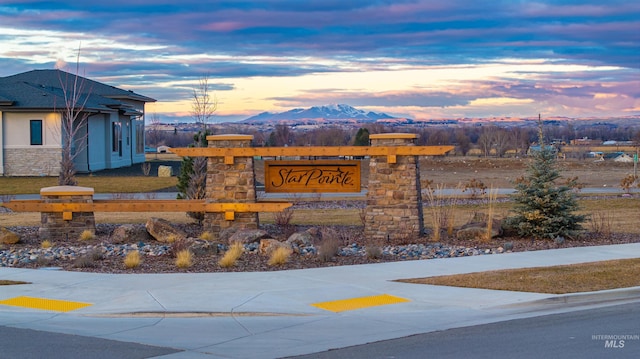 6851 N Valley Breeze Ave, Meridian, ID 83646 - exterior view of a mountain view, a downspout, stone siding, and stucco siding