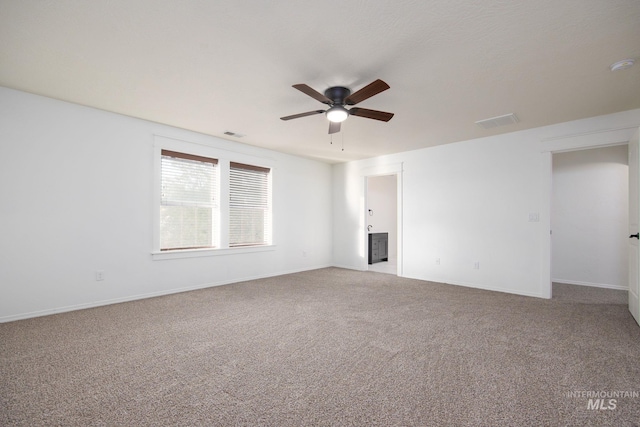 12476 W Kempshire Ct, Star, ID 83669 - carpeted spare room with ceiling fan and a smoke detector