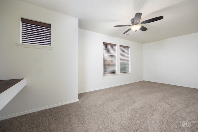 12476 W Kempshire Ct, Star, ID 83669 - spare room featuring a ceiling fan and carpet floors