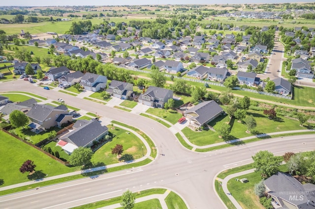 12476 W Kempshire Ct, Star, ID 83669 - aerial overview of property's location featuring nearby suburban area