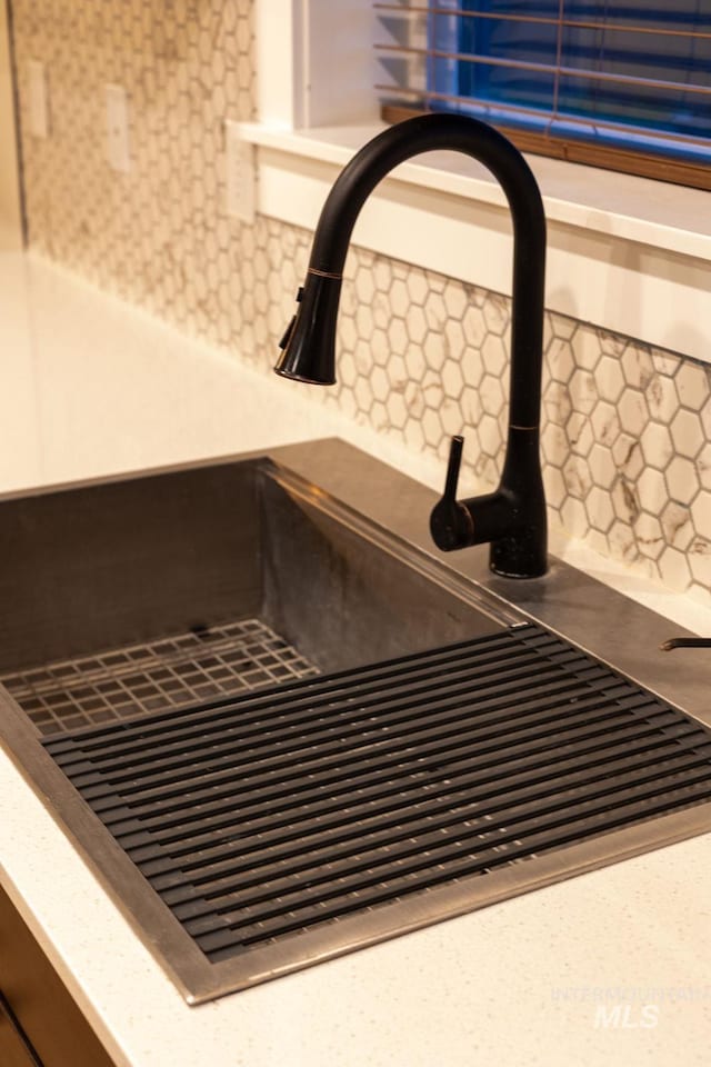 12476 W Kempshire Ct, Star, ID 83669 - kitchen view of tasteful backsplash