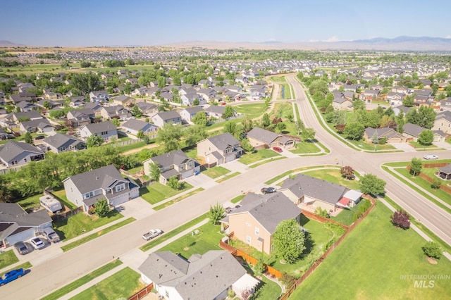 12476 W Kempshire Ct, Star, ID 83669 - aerial view of residential area with mountains