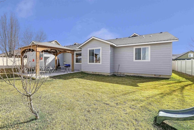 back of house featuring a lawn, a patio, fence, a gazebo, and crawl space