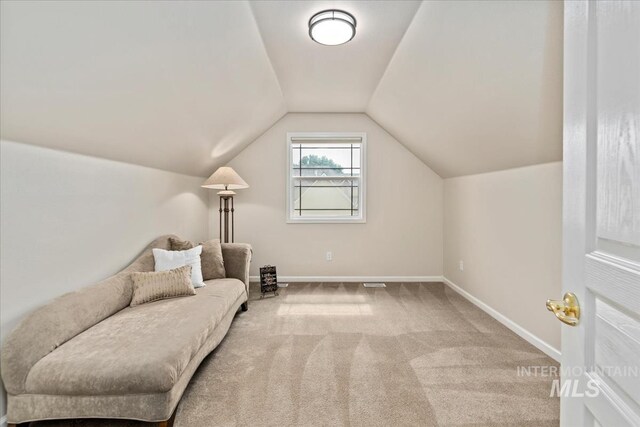 628 E Trinidad Dr, Meridian, ID 83642 - sitting room featuring carpet flooring, vaulted ceiling, and baseboards