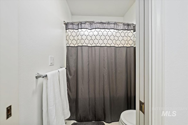 628 E Trinidad Dr, Meridian, ID 83642 - bathroom featuring toilet and a shower with shower curtain