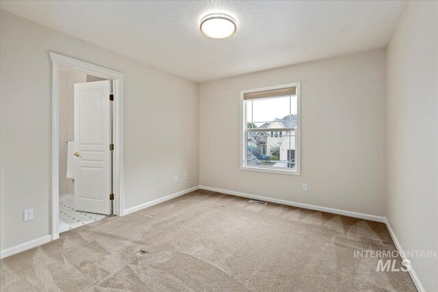 628 E Trinidad Dr, Meridian, ID 83642 - carpeted empty room with baseboards