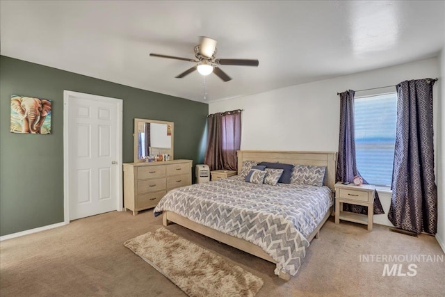 197 Cedarpark Cir, Twin Falls, ID 83301 - bedroom with light carpet, a ceiling fan, and baseboards
