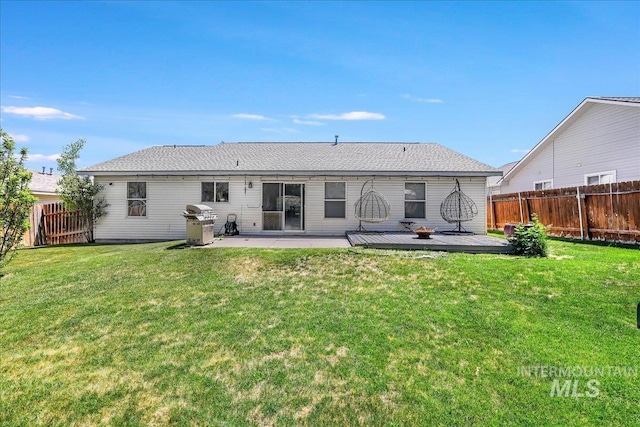 197 Cedarpark Cir, Twin Falls, ID 83301 - back of house featuring a wooden deck and a patio area