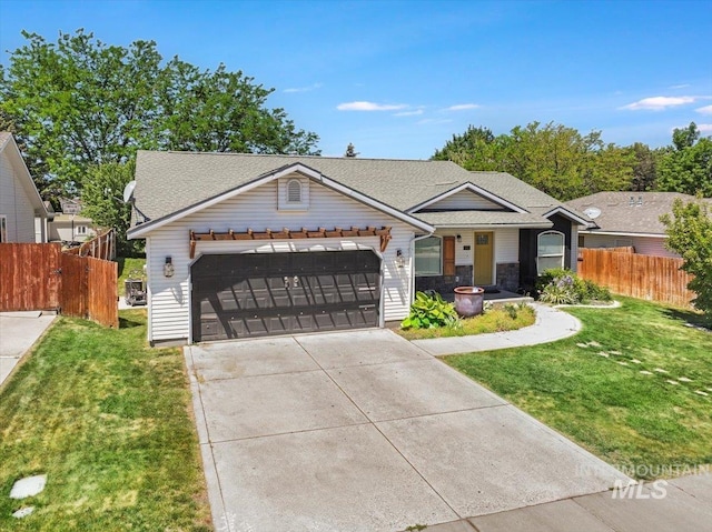 197 Cedarpark Cir, Twin Falls, ID 83301 - view of front facade with a garage, driveway, and roof with shingles