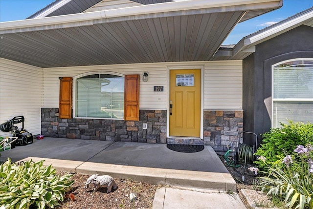 197 Cedarpark Cir, Twin Falls, ID 83301 - property entrance with stone siding and covered porch