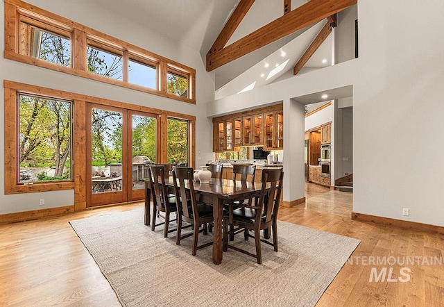 1040 W Bogus Vw, Eagle, ID 83616 - dining room with french doors, recessed lighting, light wood-style flooring, baseboards, and high vaulted ceiling