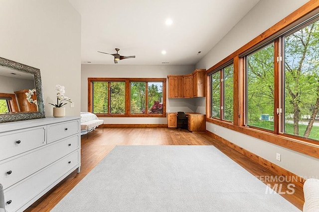 1040 W Bogus Vw, Eagle, ID 83616 - interior space with baseboards, recessed lighting, ceiling fan, and wood finished floors
