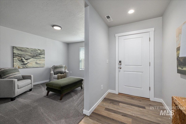 4849 N Willowside Ave, Meridian, ID 83646 - entryway featuring wood finished floors and baseboards