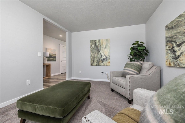 4849 N Willowside Ave, Meridian, ID 83646 - living room featuring carpet flooring, baseboards, and recessed lighting