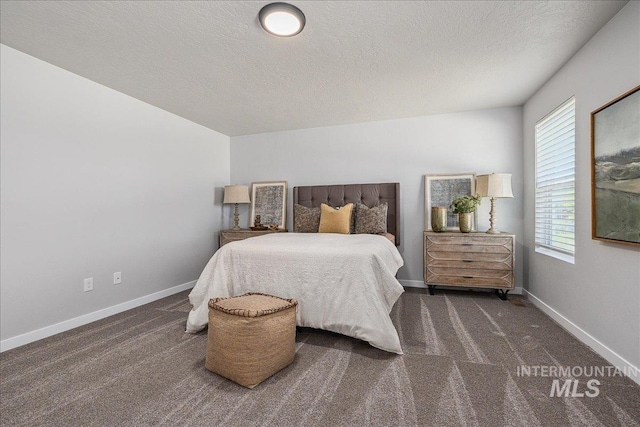 4849 N Willowside Ave, Meridian, ID 83646 - carpeted bedroom with baseboards and a textured ceiling