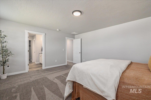4849 N Willowside Ave, Meridian, ID 83646 - bedroom featuring carpet, baseboards, and a textured ceiling