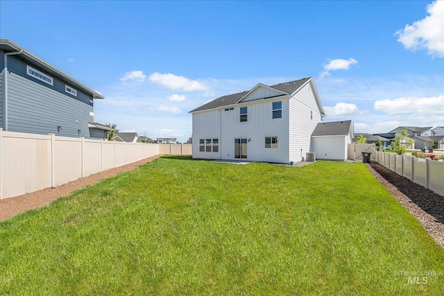 4849 N Willowside Ave, Meridian, ID 83646 - back of house featuring board and batten siding and central AC