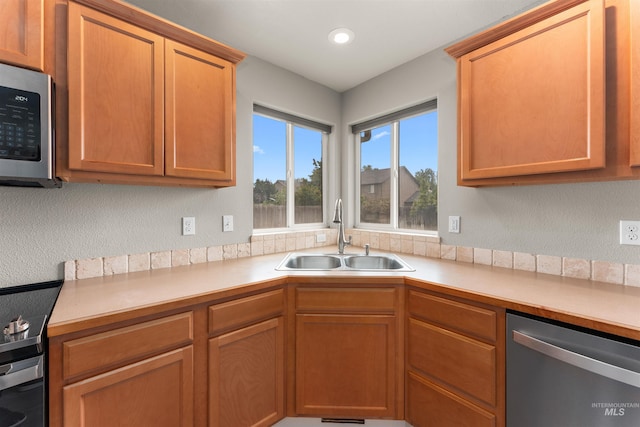5291 N Midnight Haze Way, Meridian, ID 83646 - kitchen with stainless steel appliances, light countertops, and recessed lighting